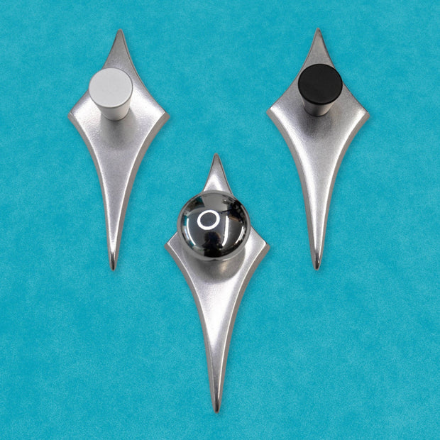Polished aluminum Comet Drawer Pull with a matte black cone knob and streamlined mid-century design.