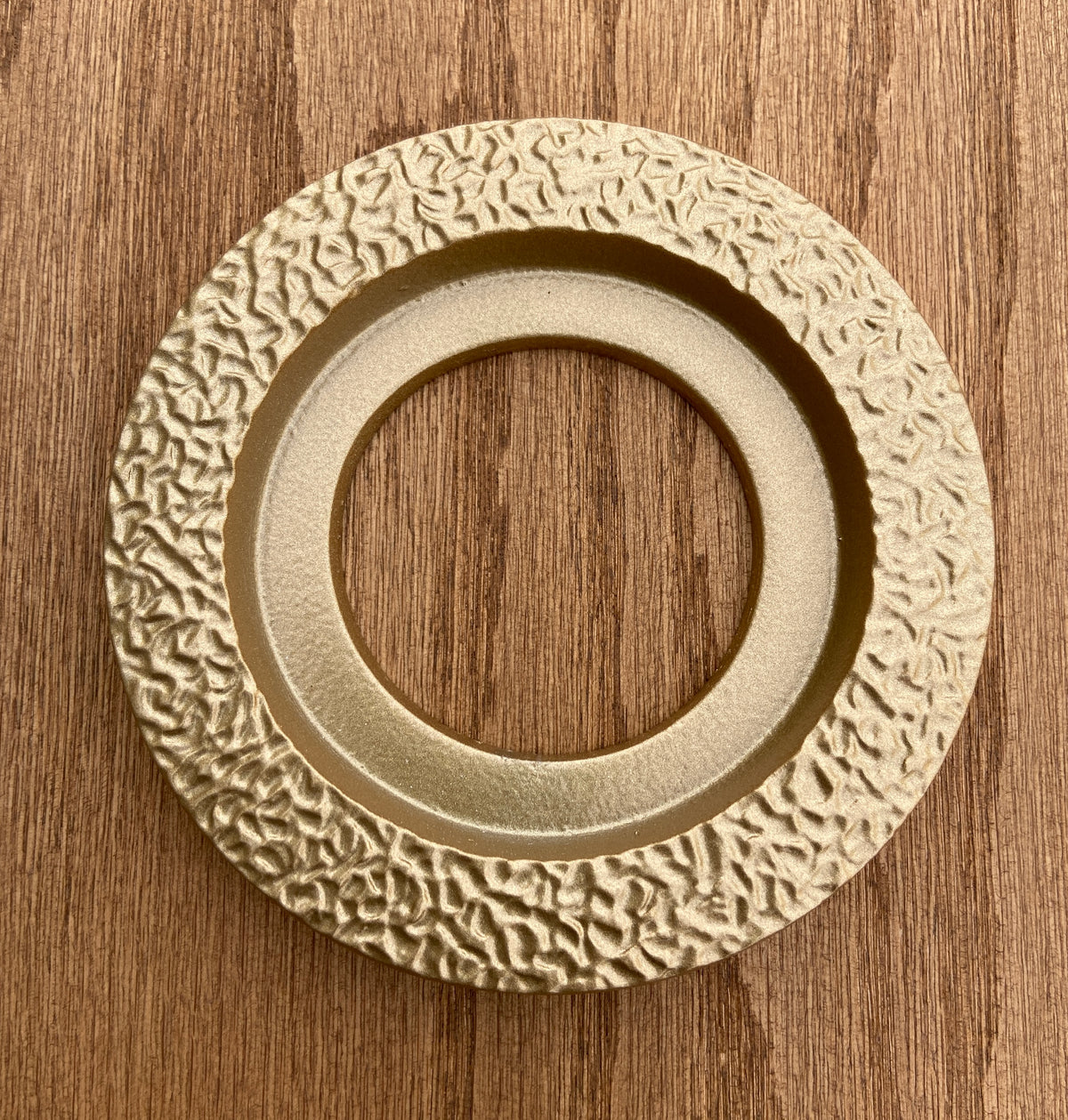 Orbit Doorknob Escutcheon in cast aluminum with hand-textured finish and Mid-Century Modern circular design.