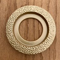 Orbit Doorknob Escutcheon in cast aluminum with hand-textured finish and Mid-Century Modern circular design.