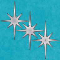 Large 10½-inch handcrafted aluminum Atomic Starburst with shiny hammered finish for door or wall decor.