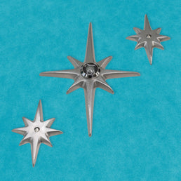 Angled photo of the set of three with peephole. You can clearly see the surface texture of the aluminum. The points and edges aer nicely smoothed and rounded. There is light reflection off the metal. 