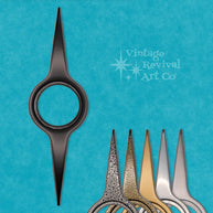 Zenith Atomic Doorknob Escutcheon in cast aluminum with sweeping spires and a rounded center, inspired by Mid-Century Modern design.