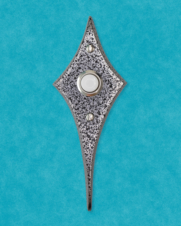 Mid-century modern Comet Doorbell Button in a metallic finish.