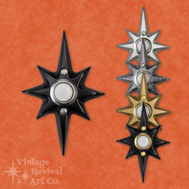A collection of Atomic Starburst Doorbell Buttons with cast aluminum decorative plate.