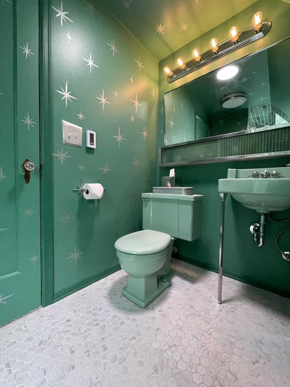 Atomic Starburst bathroom accessories displayed as a coordinated collection.
