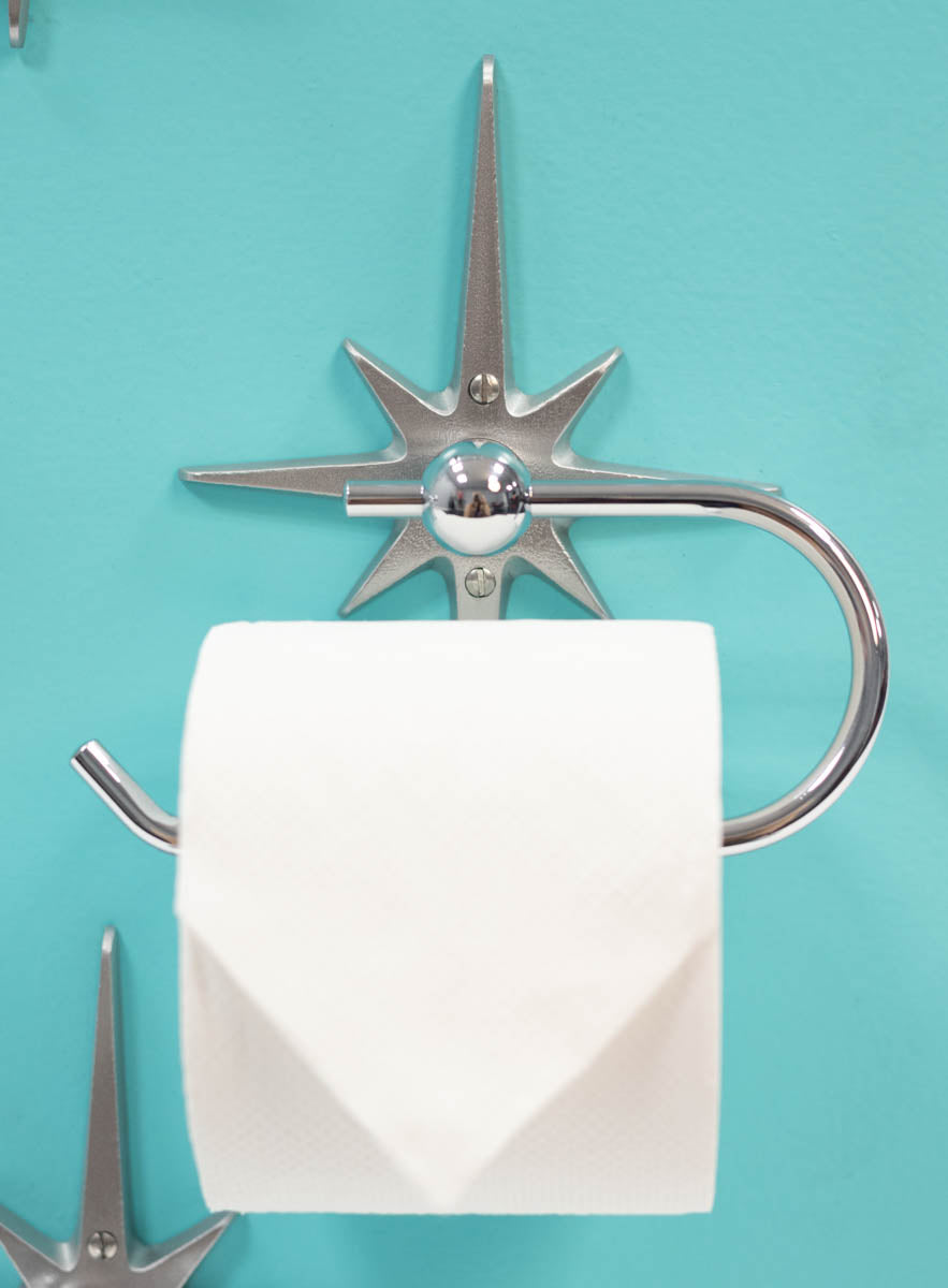 Single-post retro toilet paper holder with chrome-plated stainless steel loop.