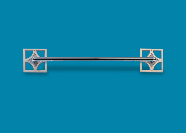Breeze Block Towel Bar with handcrafted aluminum geometric backplates and chrome-finished bar in a mid-century modern design.